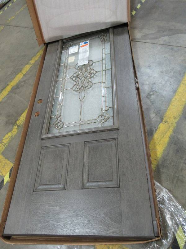 lot 94 image: Fibermate Gray Ash 80 X 36 Door with Antique Brass and Glass Window.