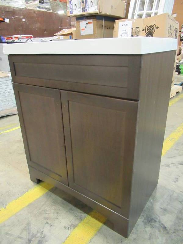 lot 52 image: Dark Pressed Wood finish Vanity and Composite White Top.