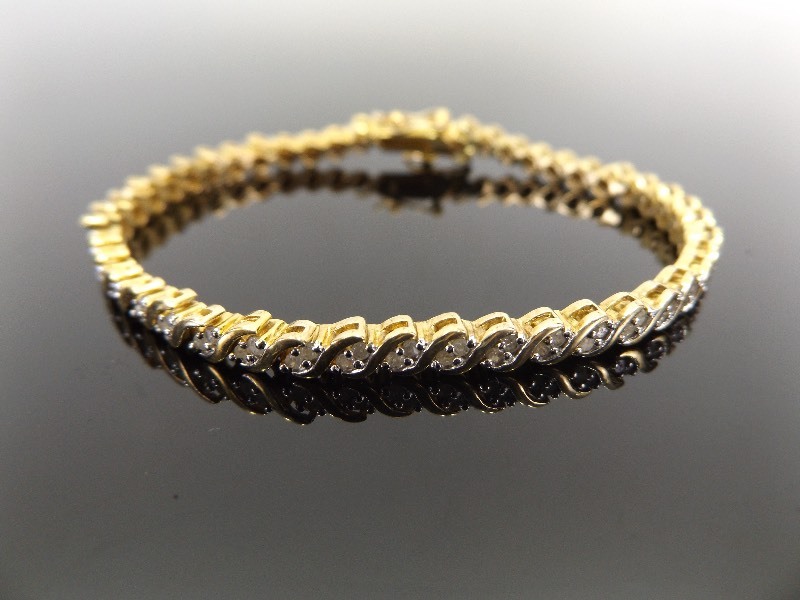 lot 18 image: .925 Sterling Silver Diamond Tennis Bracelet