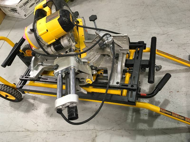 lot 23 image: Dewalt DWS780 12 in. Double Bevel Sliding Compound Miter Saw  Used in good working cond.