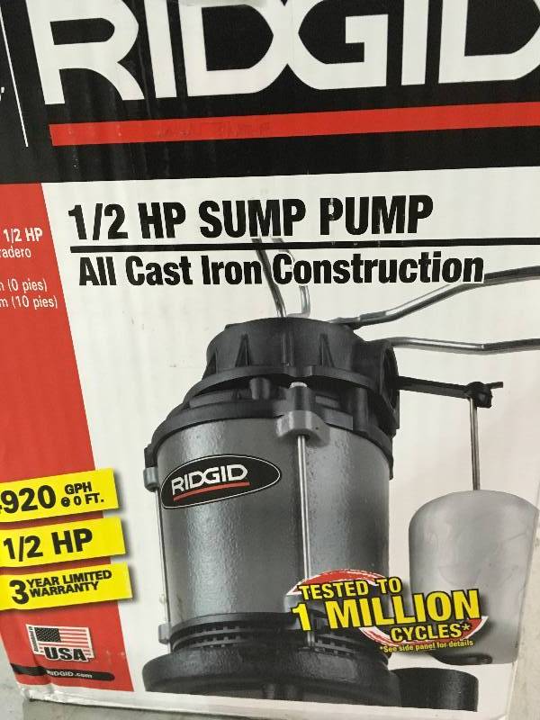 lot 27 image: Ridgid 12 HP Cast Iron Submersible Sump Pump in good conditions