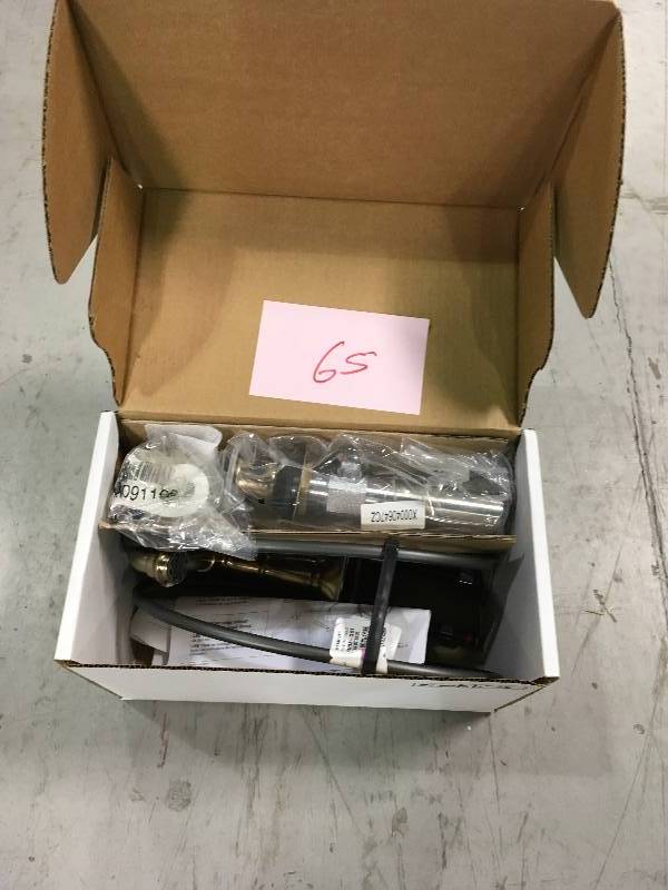 lot 65 image: Delta 2555-CZMPU-DST Victorian Two Handle Centerset Lavatory Faucet - Metal Pop-Up With Finish Champagne Bronze Used in good working cond.