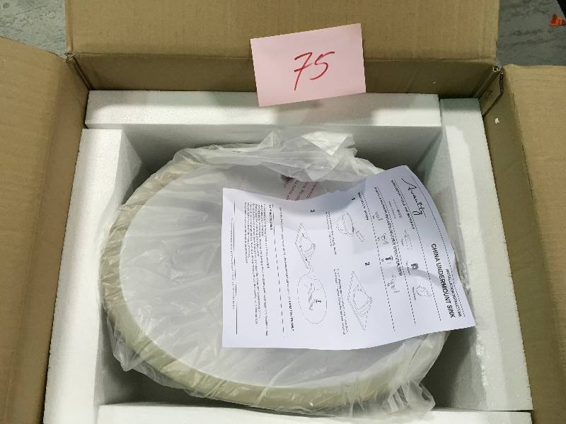 lot 75 image: Undermount Bathroom Sink in White not used