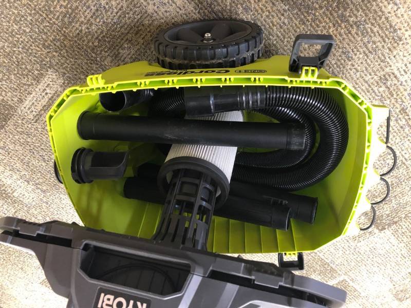 lot 115 image: Ryobi 18-Volt ONE 6 Gal. Cordless WetDry Vacuum (Tool Only) with Hose in good working condition missing side clips