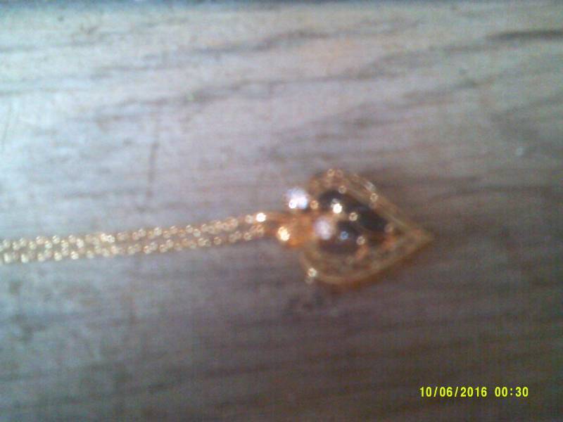 GOLD , DIAMOND , BLACK STONE NECKLACE