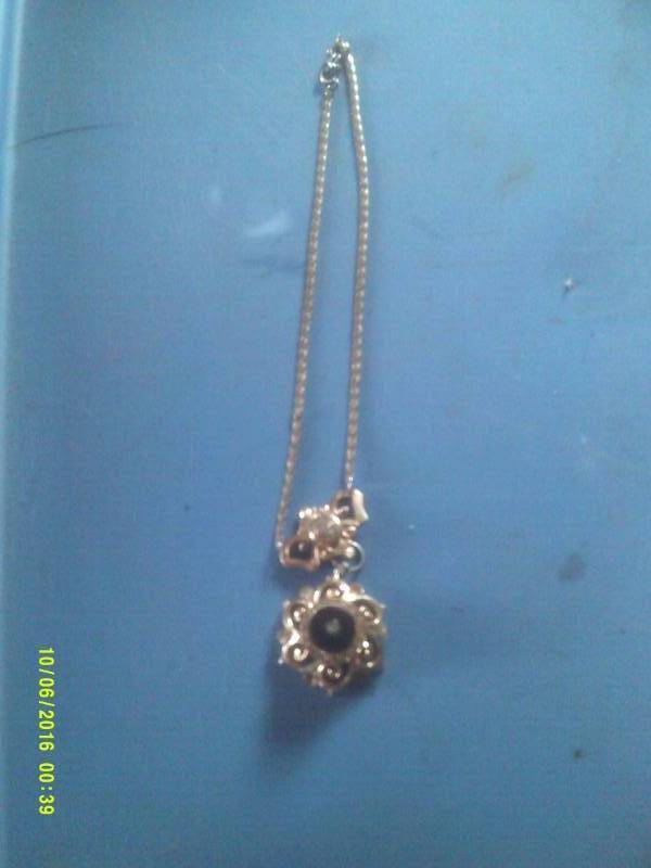GOLD NECKLACE WITH DIAMOND AND BLACK STONES