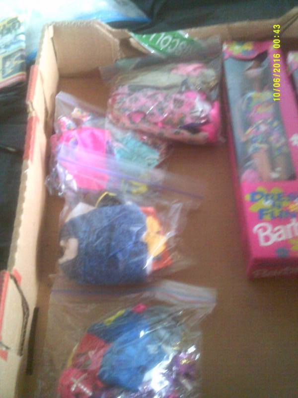 COLLECTIBLE BARBIES AND CLOTHS