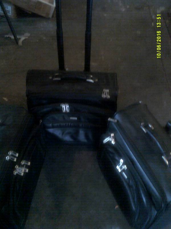 3 LEATHER BAGS ON WHEELS