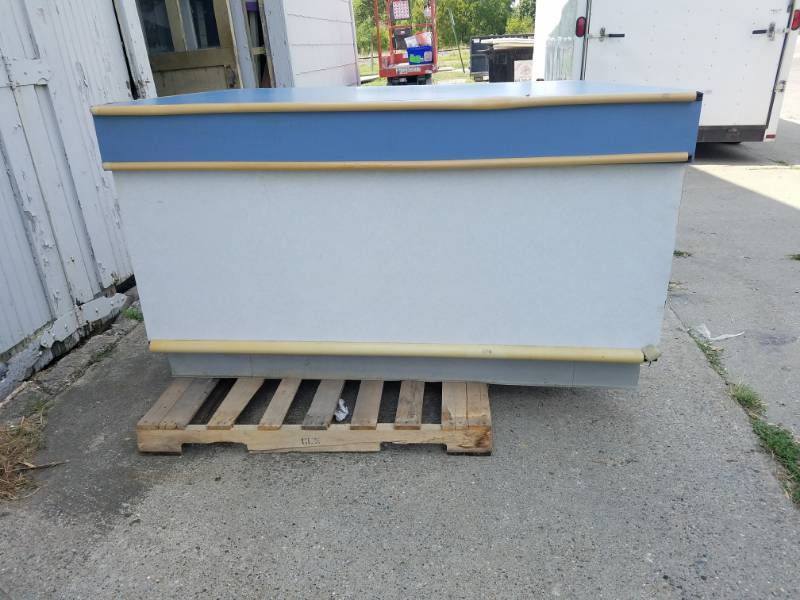 lot 13 image: Check-Out Counter
