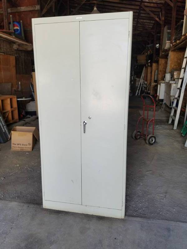 lot 25 image: 2-Door Storage Cabinet