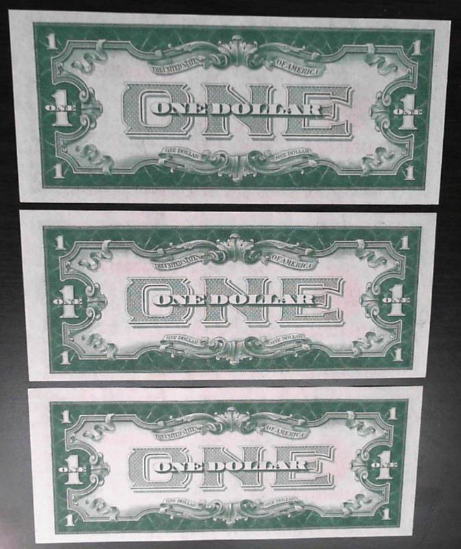 EXTREMEMLY RARE 3 CONSECUTIVE SERIAL NUMBER 1928 US $1 RED SEAL FUNNY BACK NOTES