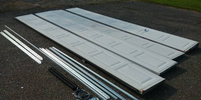 lot 1 image: Insulated 16x7 Garage Door, with hardware