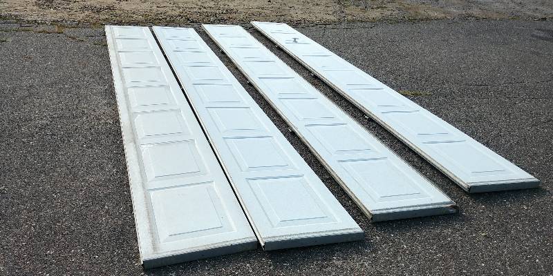 lot 2 image: 16x7 non-Insulated Garage Door