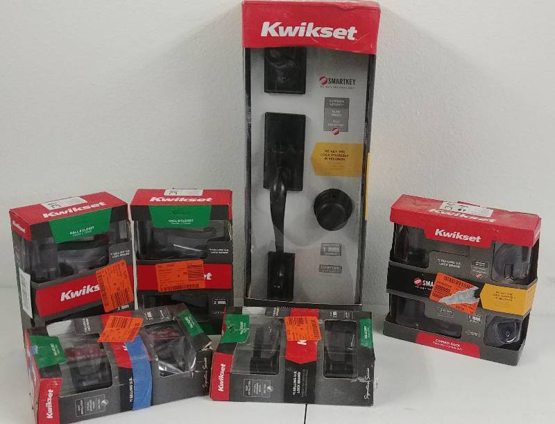 lot 14 image: Kwikset Bronze Lever Handle Entry Locksets Multi-Pack Grouping