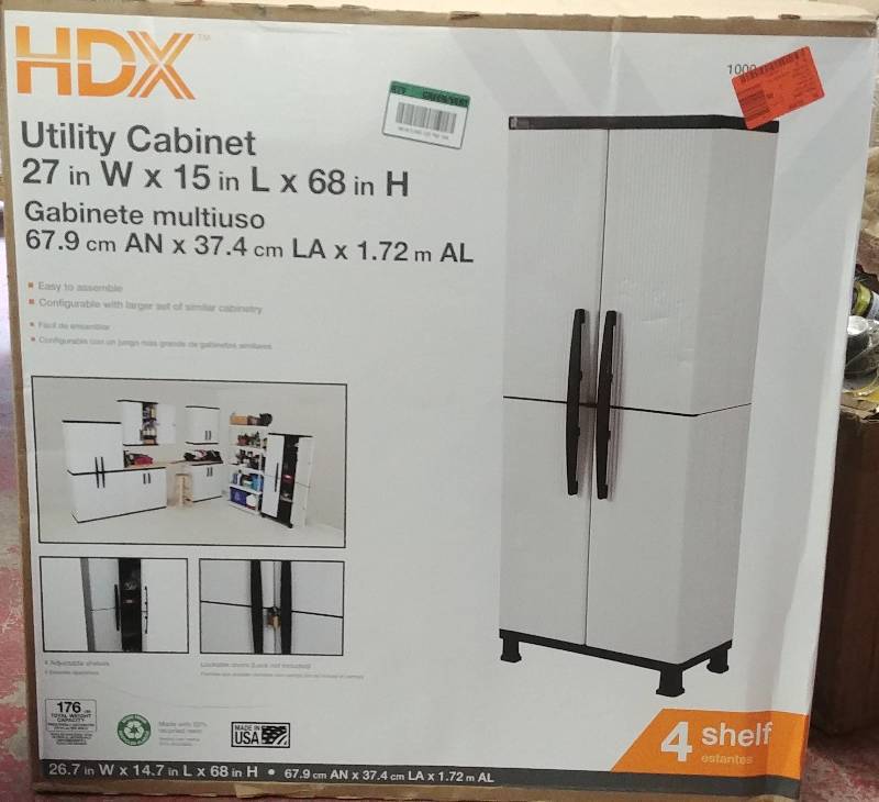lot 28 image: HDX Utility Cabinet 27w X 15L X 68H