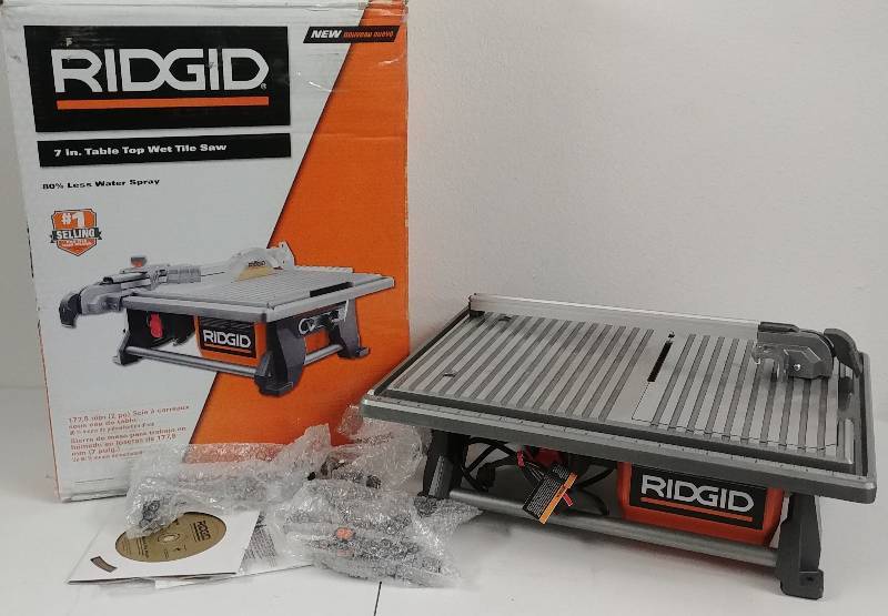lot 60 image: Ridgid 7 Table Top Wet Tile Saw