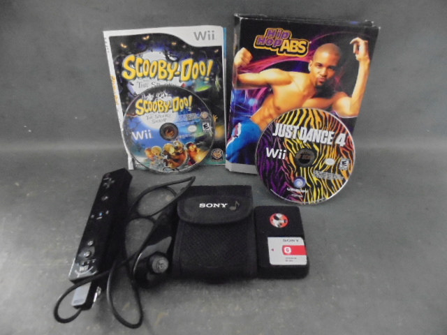 lot 36 image: Wii Game Controller, Games and More