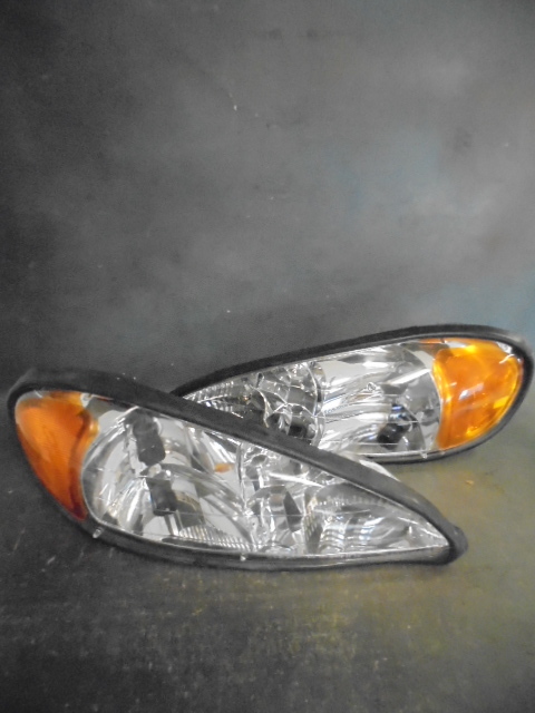 lot 70 image: Grand AM Headlights