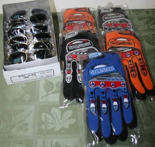 lot 121 image: Sports Gloves and Sunglasses