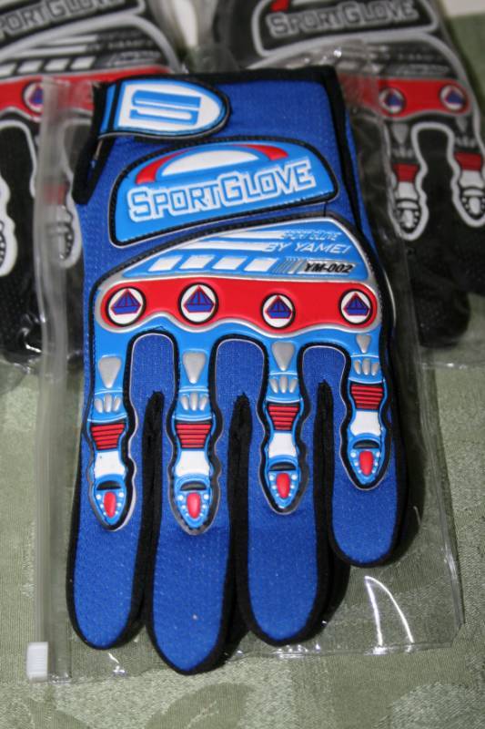 lot 129 image: Sports Gloves and Sunglasses