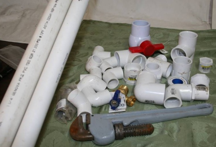 lot 365 image: Aluminum Pipe Wrench and Plumbing Materials
