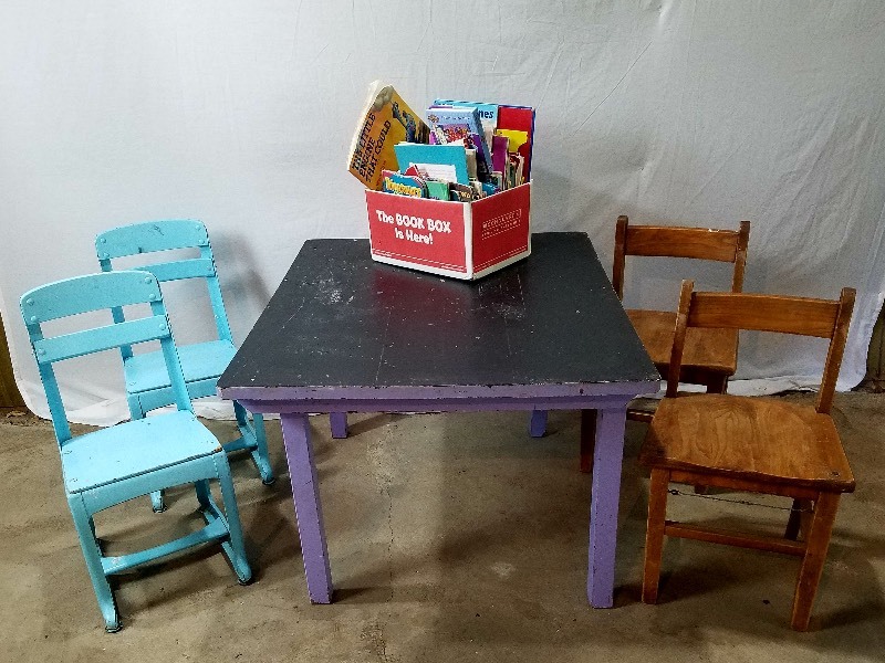 lot 5 image: Folding Wood Table with 4 Wood Chairs & books
