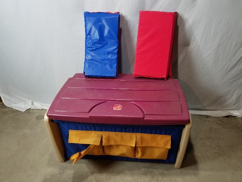 lot 8 image: 35 x 32 inch Plastic storage container & two nap mats