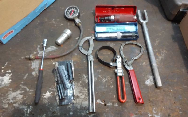 lot 145 image: 2-Impact Drivers, 2-Oil Filter Wrenches, Pickle Fork, Other Hand Tools