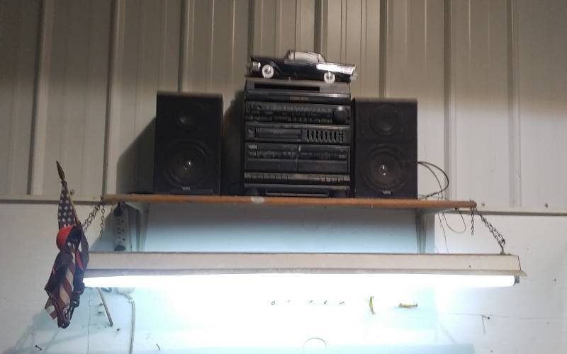 lot 153 image: Shop Light With Extra Light Bulbs, Stereo & Speakers, 57 Chevy Model