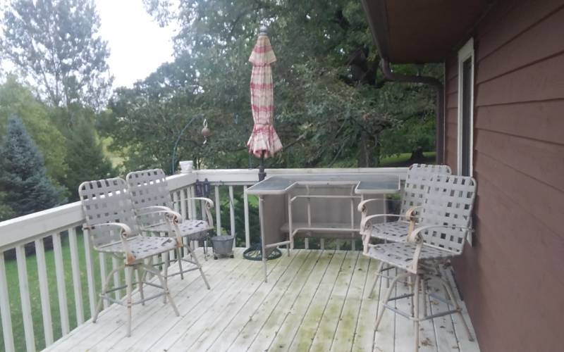 lot 209 image: Patio Bar Table 48x58, 4-Chairs, Umbrella With Stand, Planters, Pot Hangers, Misc