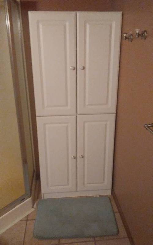lot 230 image: White 4-Door Storage Cabinet With Bathroom Accessories 30x16x72