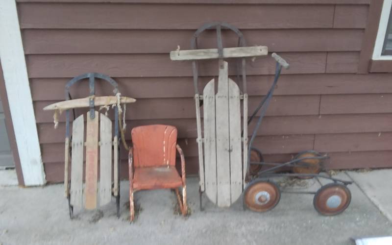 lot 245 image: 2-Old Wood Sleds, Vintage Metal Kids Chair, Rubber Tire Buggy Frame