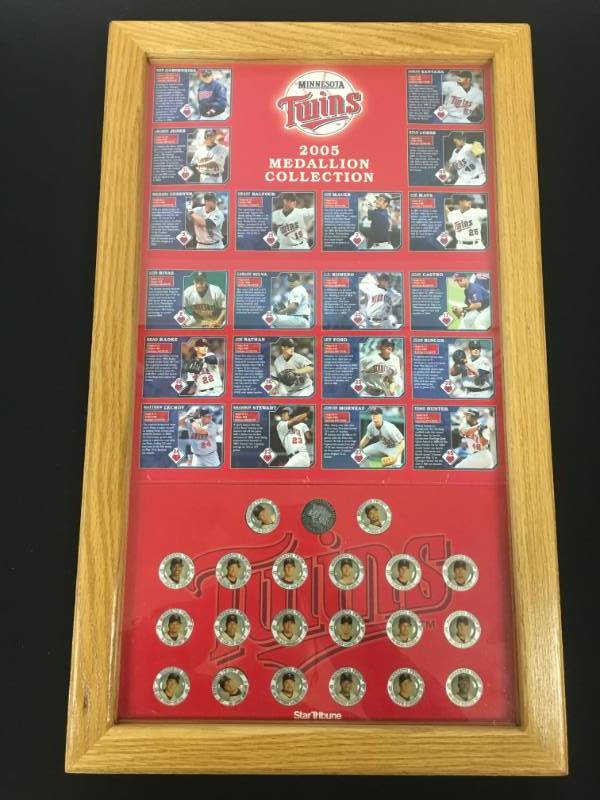 lot 24 image: 2005 Minnesota Twins Framed Medallion Collection - 26 x 16