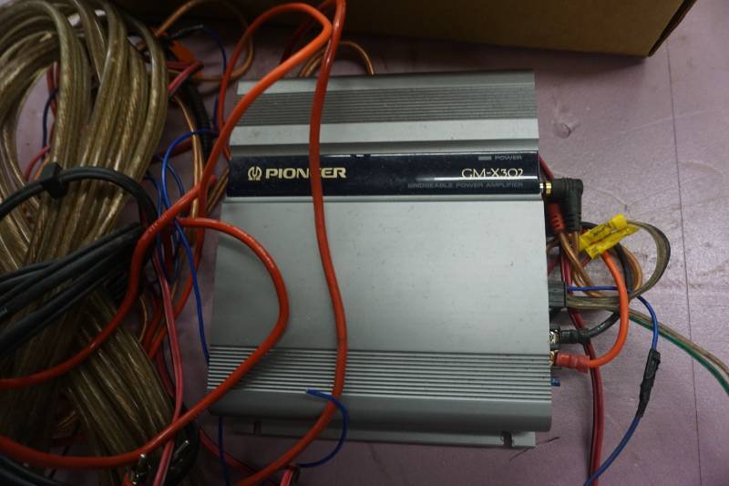 lot 34 image: Pioneer Model GMX302 Bridgeable Power Amp With Cables