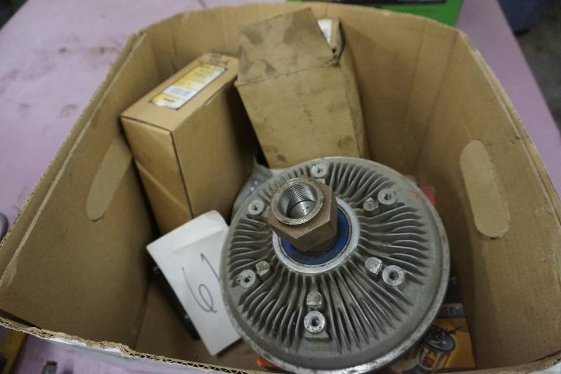 lot 29 image: Lot of Assorted Oil Filters O-Rings, Spark Plugs and Fan Clutch