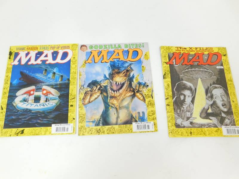lot 102 image: Vintage Three Madd Comic Books