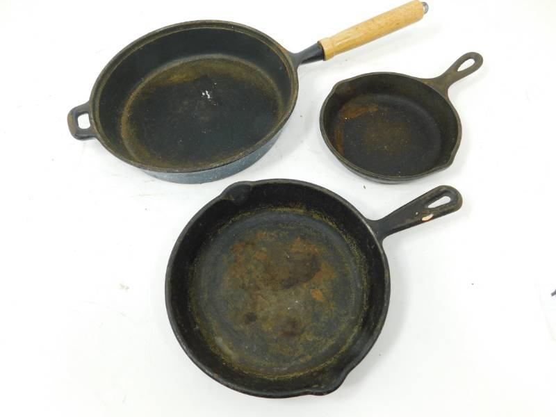 lot 114 image: Three Vintage Cast Iron Skillets