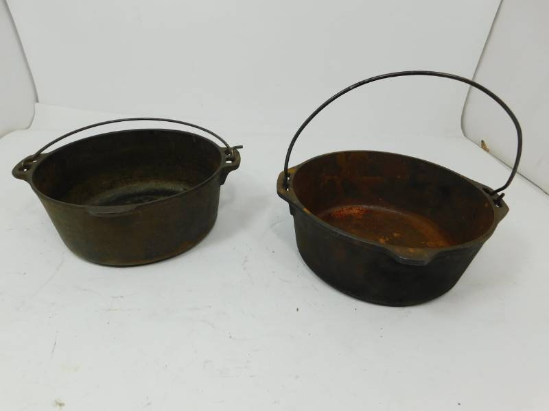 lot 115 image: Two Vintage Cast Iron Kettles With Handles