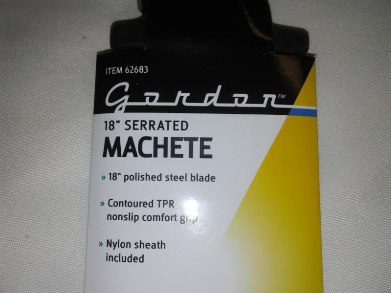 lot 1 image: 18 inch serrated machete. New