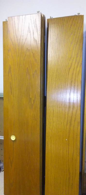 lot 2 image: 10 sets of Oak bi-fold doors with tracks and Hardware