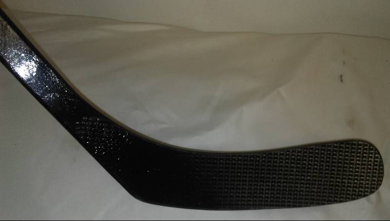lot 11 image: Winnwell Hockey Stick left Curve.