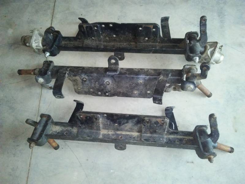 lot 23 image: 3 Axle and Frame golf cart pieces.