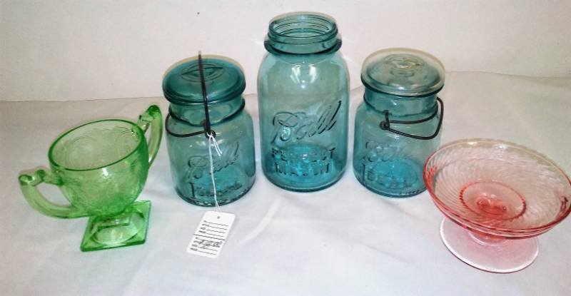 lot 59 image: 3 collectible blue ball jars, plus pink and green glass.