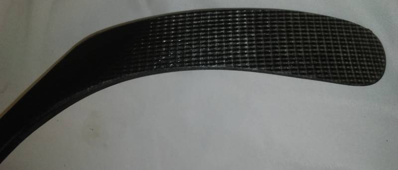 lot 9 image: Winnwell Hockey Stick left Curve.