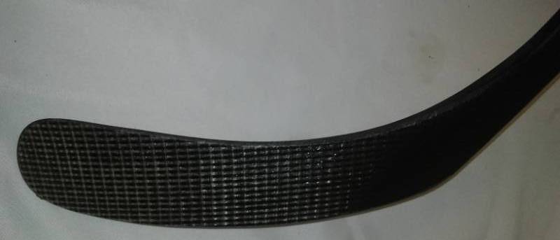 lot 8 image: Winnwell Hockey Stick left Curve.