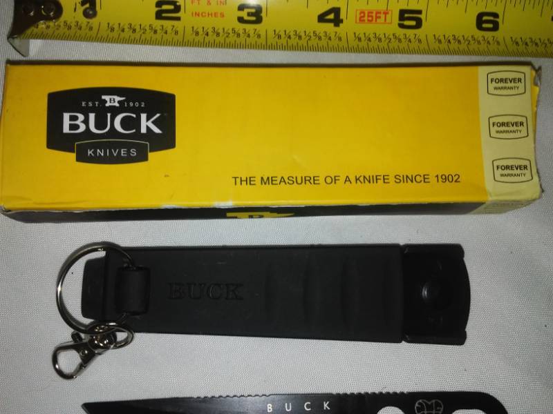 lot 84 image: Buck knife Hartshook 860 Smidgen S530 V