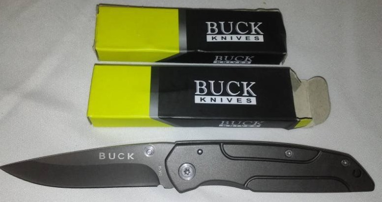 lot 111 image: 2 folding buck knives. New in box