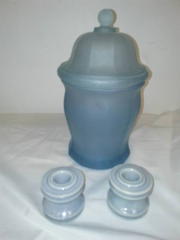 lot 120 image: Frosted Blue Glass Ginger jar with lid and two candle holders.