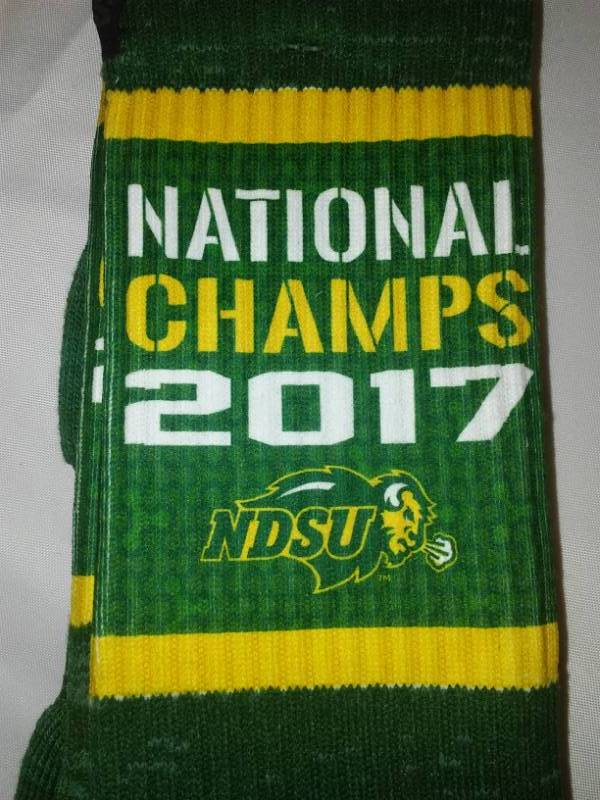lot 134 image: NDSU Bison socks, . 2017 Champions, football, new.