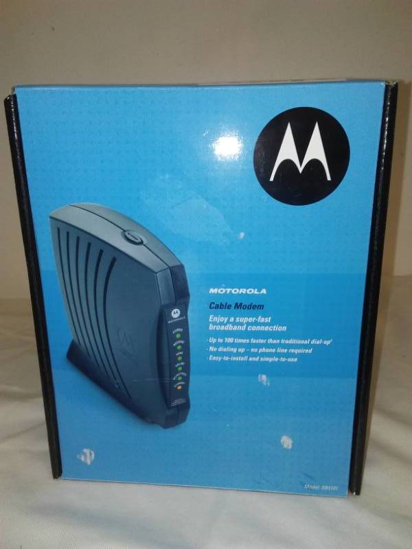 lot 149 image: Motorola new in box modem.